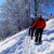 Op wandeling met sneeuwschoenen aan. Onderweg is het puur genieten van het landschap dat bedolven is onder een metersdikke sneeuwlaag.